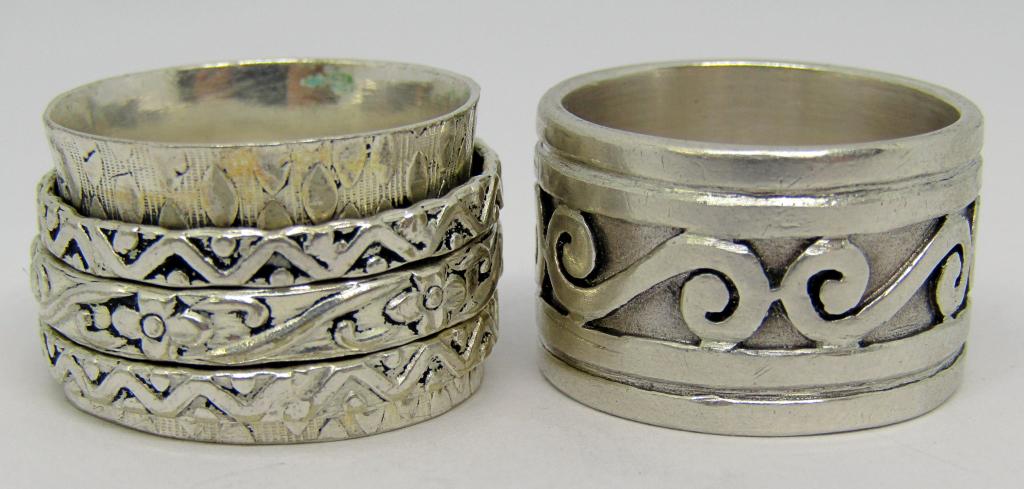 2-STERLING BANDS (1)SCROLL DESIGN (1)SLIDING: BOTH RINGS SIZE 11-TOTAL 14.7 DWT
