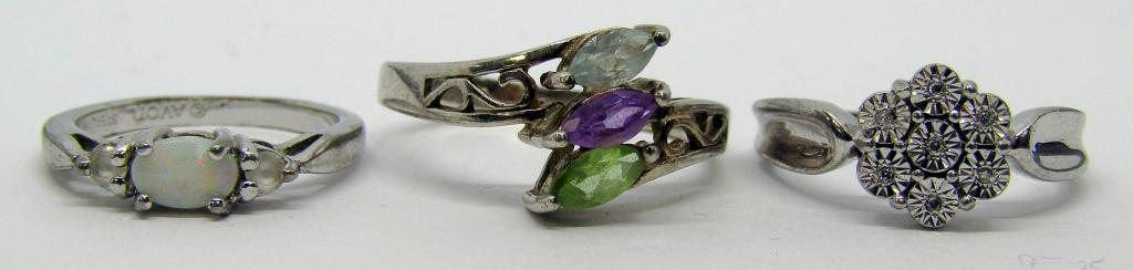 3 Sterling Rings with Opal like stone and (1 of 2)