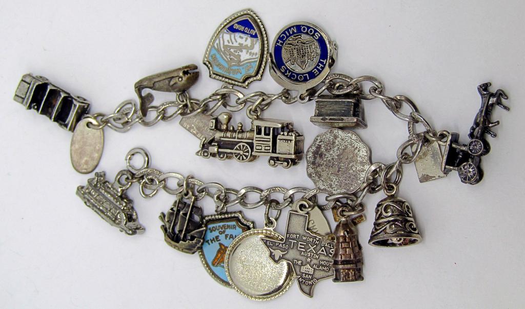 Sterling Travelers Charm Bracelet: 15 charms DWT 31.6