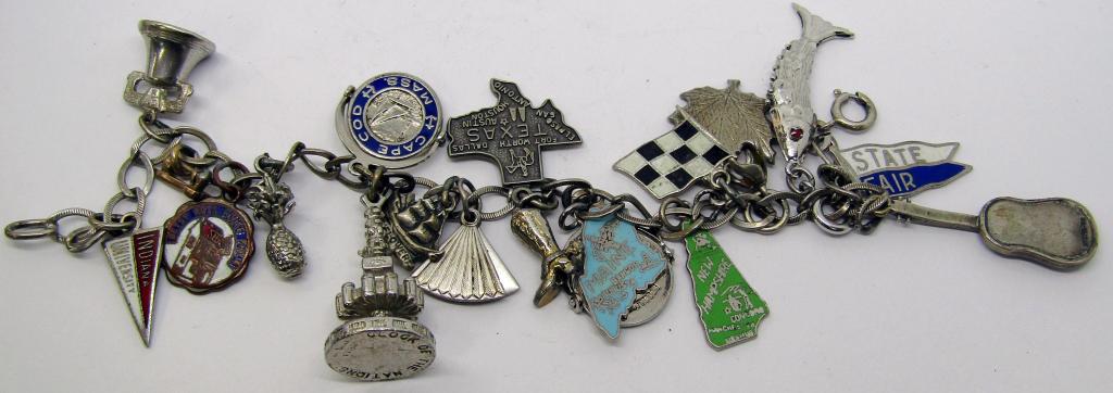 Sterling Charm Bracelet: 19 Charms DWT 25.6