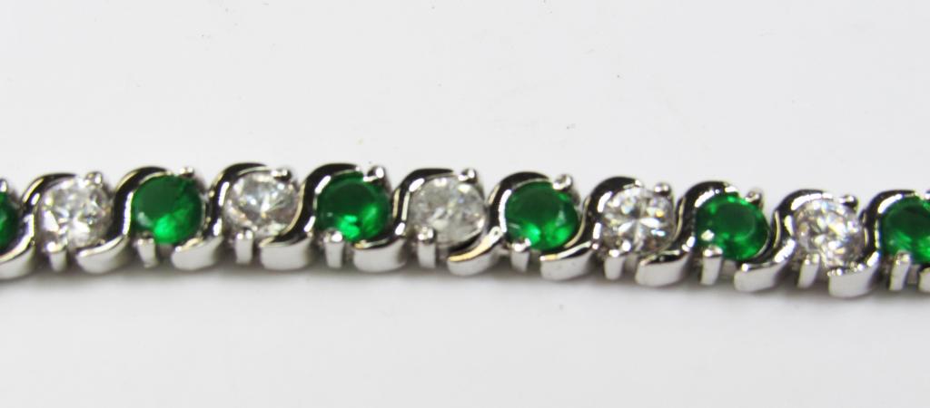 STERLING TENNIS BRACELET WITH CLEAR AND EMRALD: GREEN CENTER STONES-TOTAL 10.6 DWT