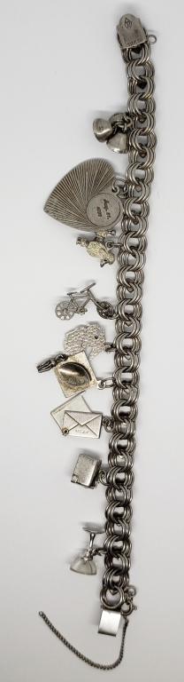 VINTAGE STERLING CHARM BRACELET WITH (9)CHARMS: TOTAL 19.8 DWT