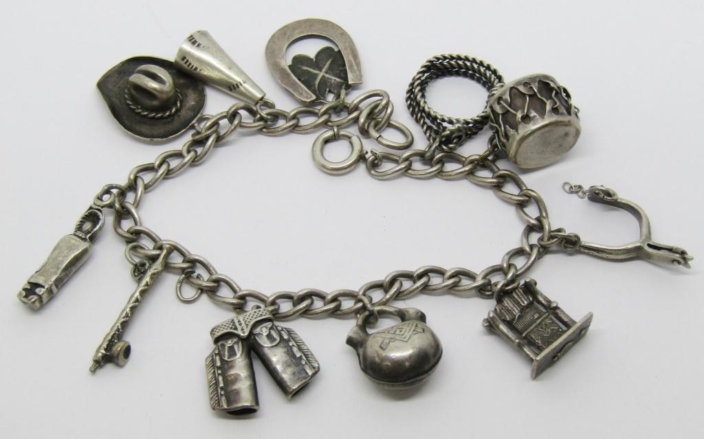 VINTAGE STERLING CHARM BRACELET WITH (11): SOUTHWESTERN CHARMS-TOTAL 18.2 DWT