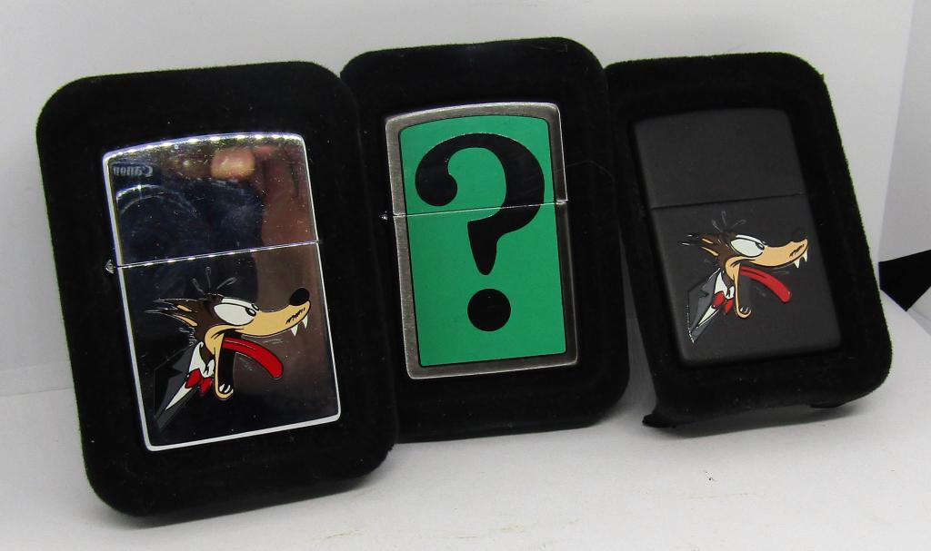 Wolf Whistle Zippo Set: 2 Wolf Whistle Zippo lights and 1 comic question mark zippo