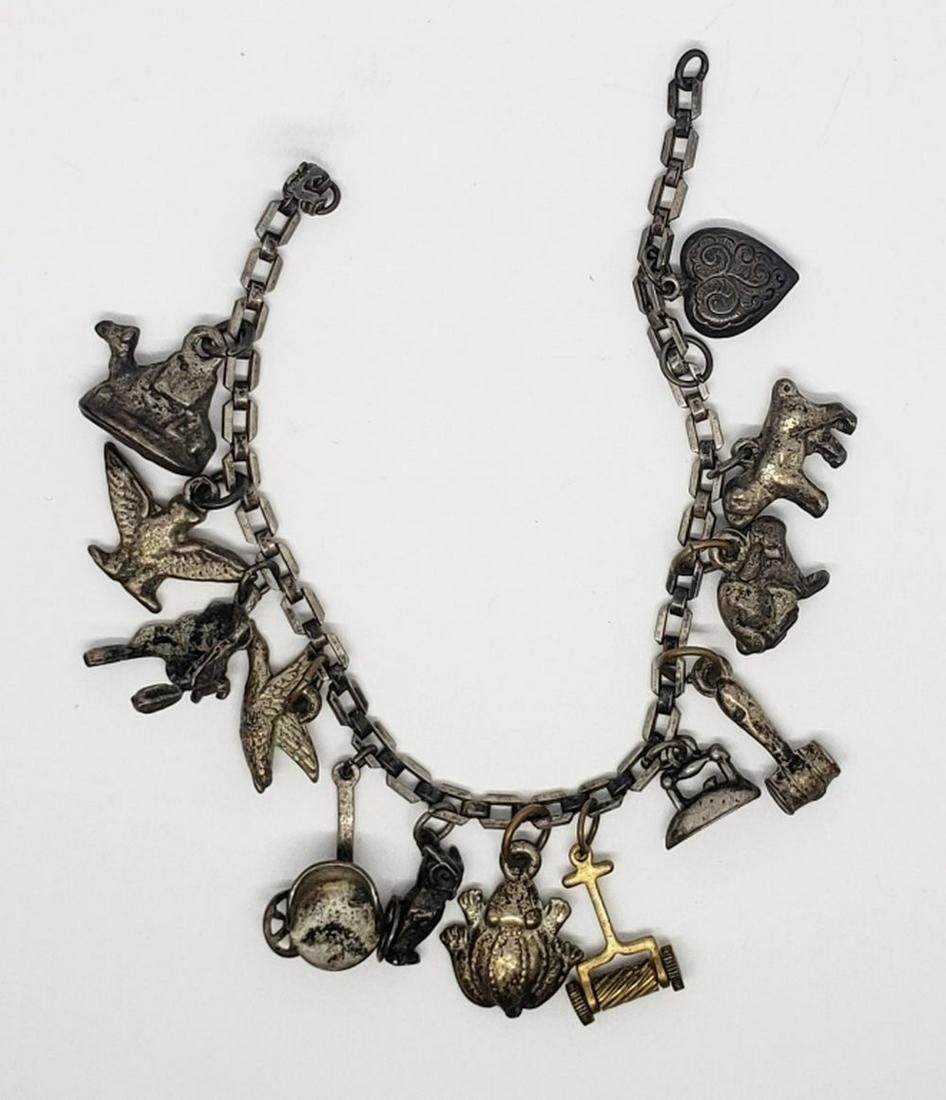 VINTAGE STERLING LILNKED CHARM BRACELET: LOADED WITH (13) CHARMS-TOTAL 21.9 DWT