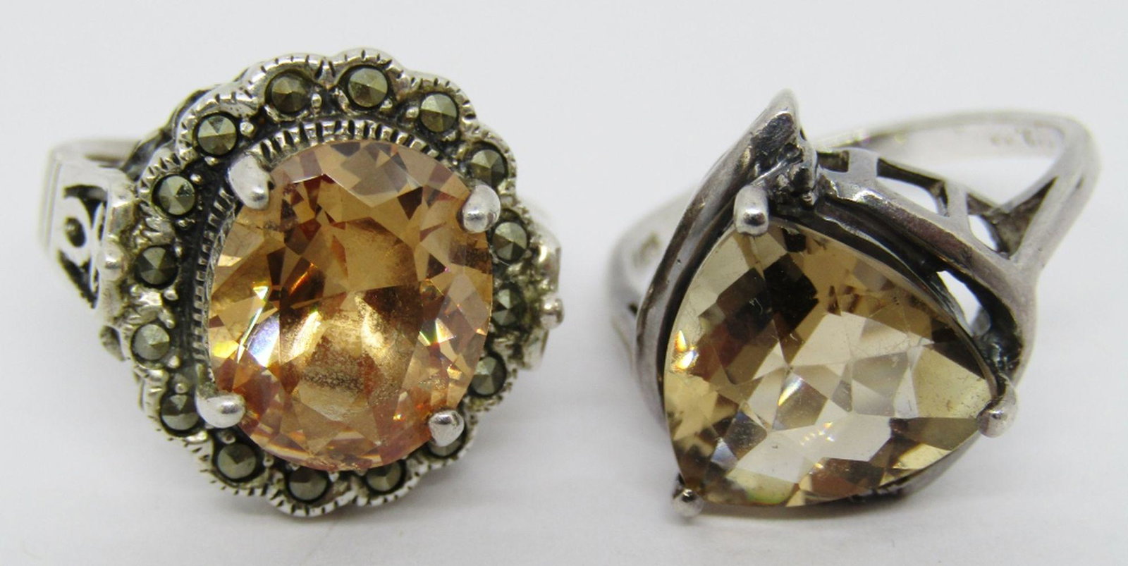 2-STERLING FASHION RINGS WITH ORANGE STONE: (1)MARCASITE ACCENTS-RING SIZES 7-TOTAL 11 DWT