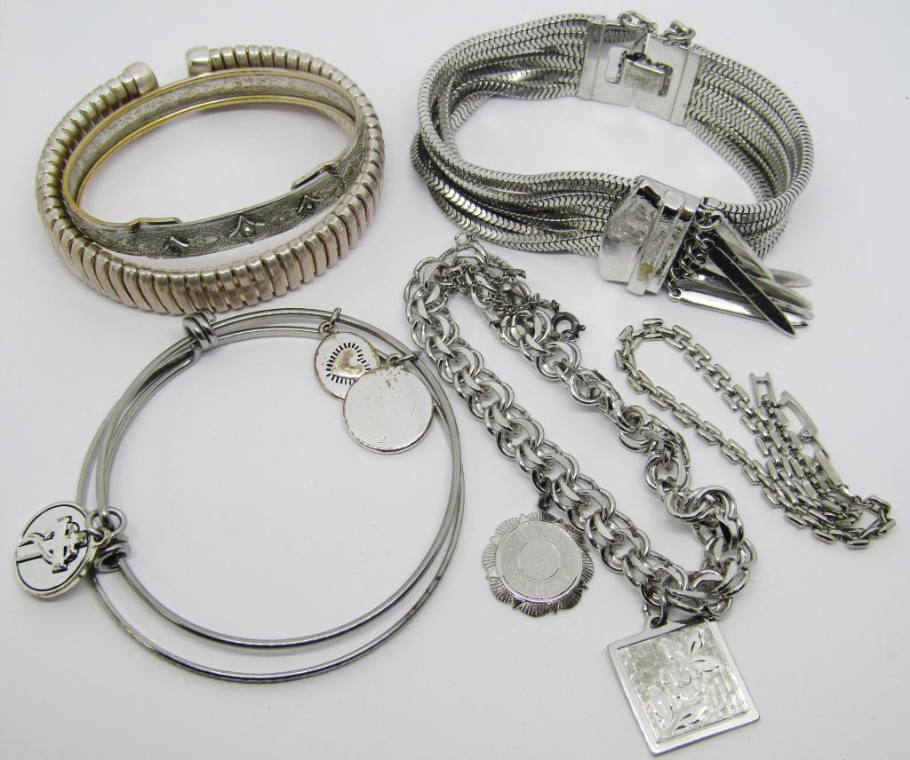 ASSORTED SILVER TONED FASHION BRACELETS: 2 BANGLE BRACELETS, 1 W/ CHARMS, 2 WESTERN STYLE BRACELETS, 1 WIDE CUFF BRACELET, 2 SMALL CHAIN LINK BRACELETS