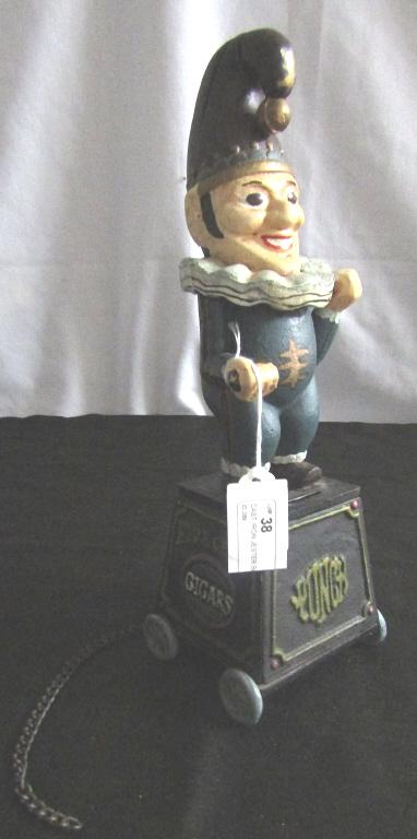 CAST IRON JESTER BANK - FIVE CENT CIGARS (1 of 3)