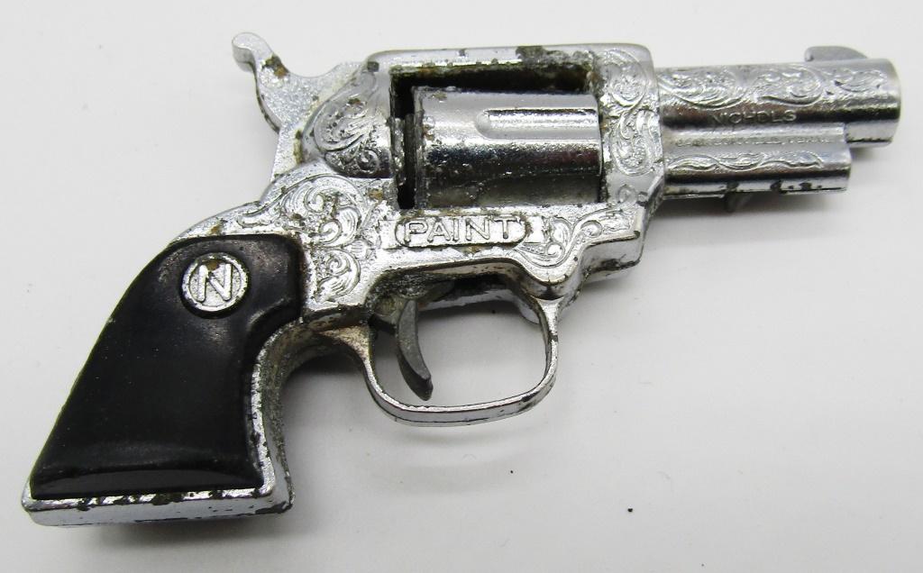 1950'S NICHOLS PAINT DERRINGER 3" CAP GUN REVOLVER: CAP GUN REVOLVER PISTOL TOY! DOES NOT COME WITH THE ORANGE PLUG! TRIGGER IS STUCK.