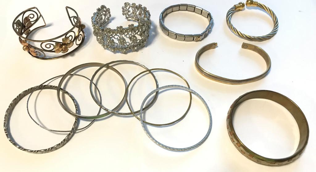 12 BRACELET/ BANGLES/ CUFFS: 1 MARKED 24 GP W/ "L" TWO TONED, 1 MARKED ZOPPINI CHARM BRACELET, RHINESTONES