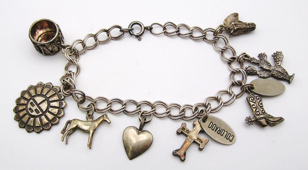 VINTAGE SOUTHWESTERN STERLING CHARM: BRACELET WITH (8)CHARMS-TOTAL 13.9 DWT