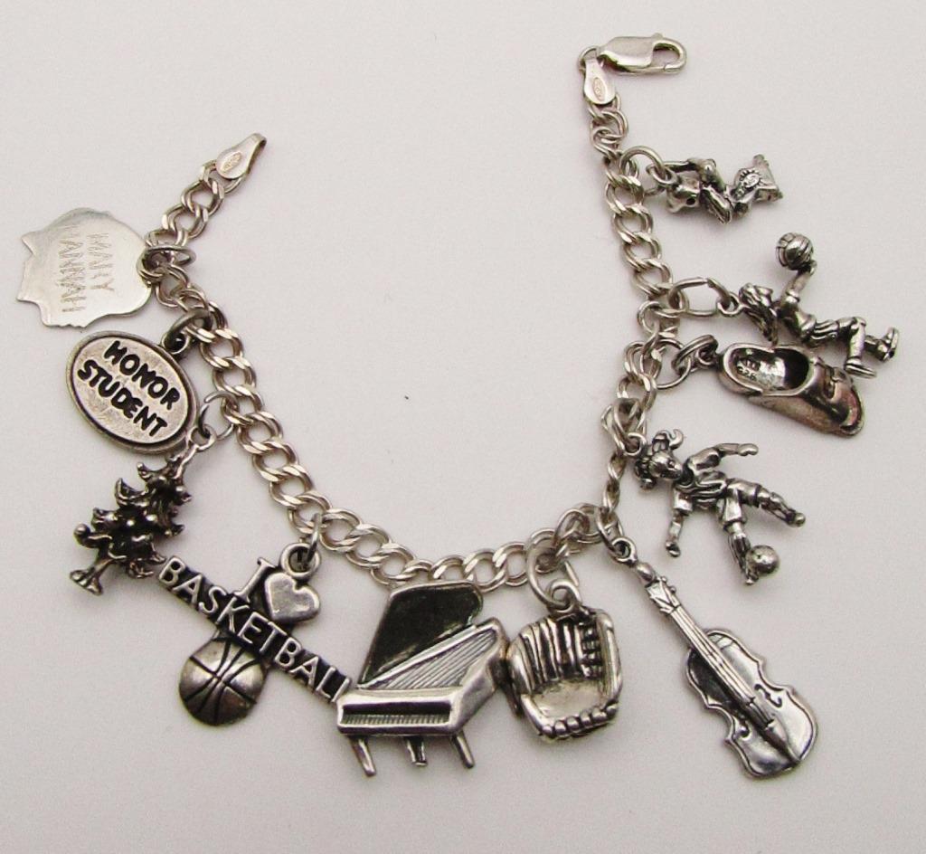 STERLING CHARM BRACELET LOADED WITH (11) (1 of 4)