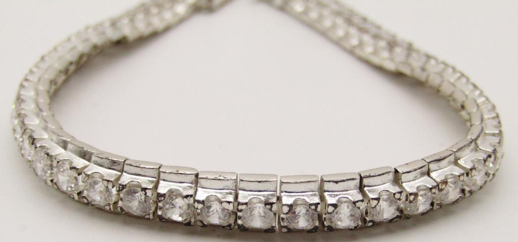 7.5 STERLING TENNIS BRACELET WITH POSS: CZ STONES! TOTAL 11.8 DWT