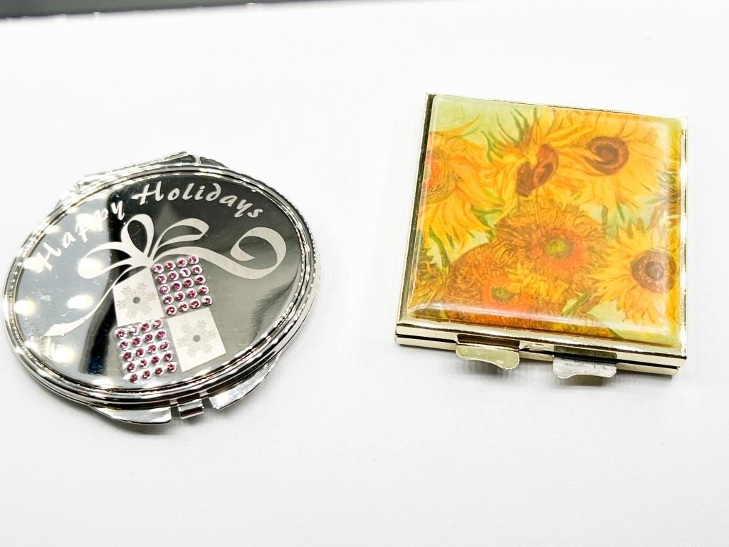 TWO MIRRORED COMPACTS, ONE LOT (1 of 2)