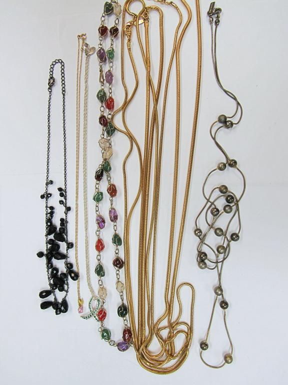 8 NECKLACES! SOME MARKED: BLACK, CLEAR RHINESTONES, LC & MONET, DAISY FUENTES