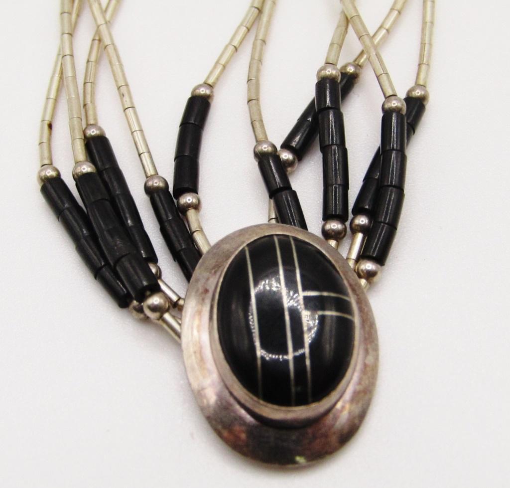 MULTI STRANDED LIQUID STERLING BRACELET (1 of 5)