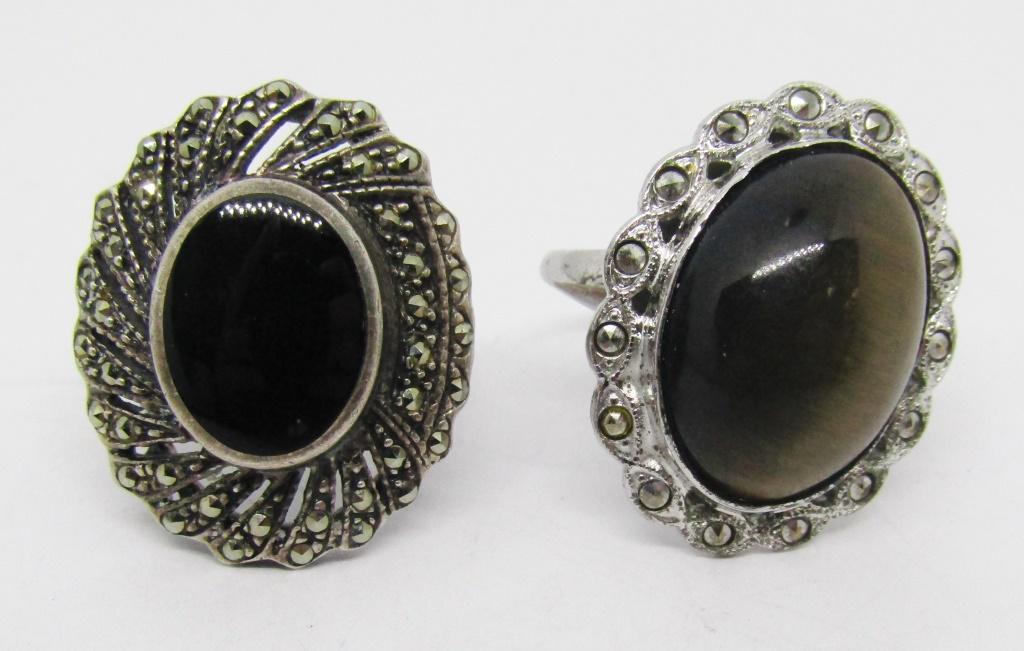 2-VINTAGE STERLING FASHION RINGS:: (1)MARCASITE WITH BLACK ONYX INLAY CENTER STONE (1)WITH BROWN MARBLE CENTER STONE-RING SIZES 6 & 7-TOTAL 8 DWT