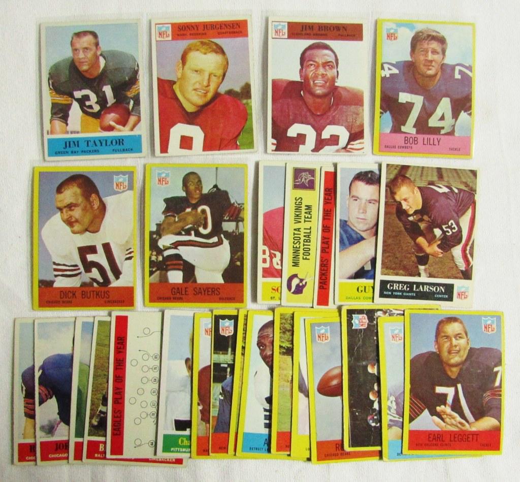 PHILADELPHIA FOOTBALL LOT 1964-1967 (27cds): (11) 1964 w/JIM TAYLOR EX rest VGEX; (1) 1965 EX, (2) 1966 #41 JIM BROWN EX, #185 JURGENSON VGEX; (13) 1967 w/#28 BUTKUS VG, #35 SAYERS VG, #55 LILLY VGEX, Rest VG