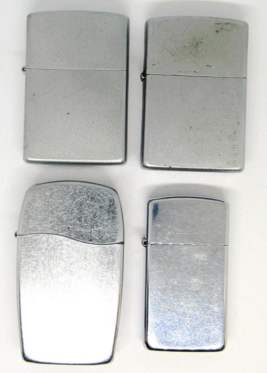 (4) 2005 ZIPPO LIGHTERS! (1 of 5)