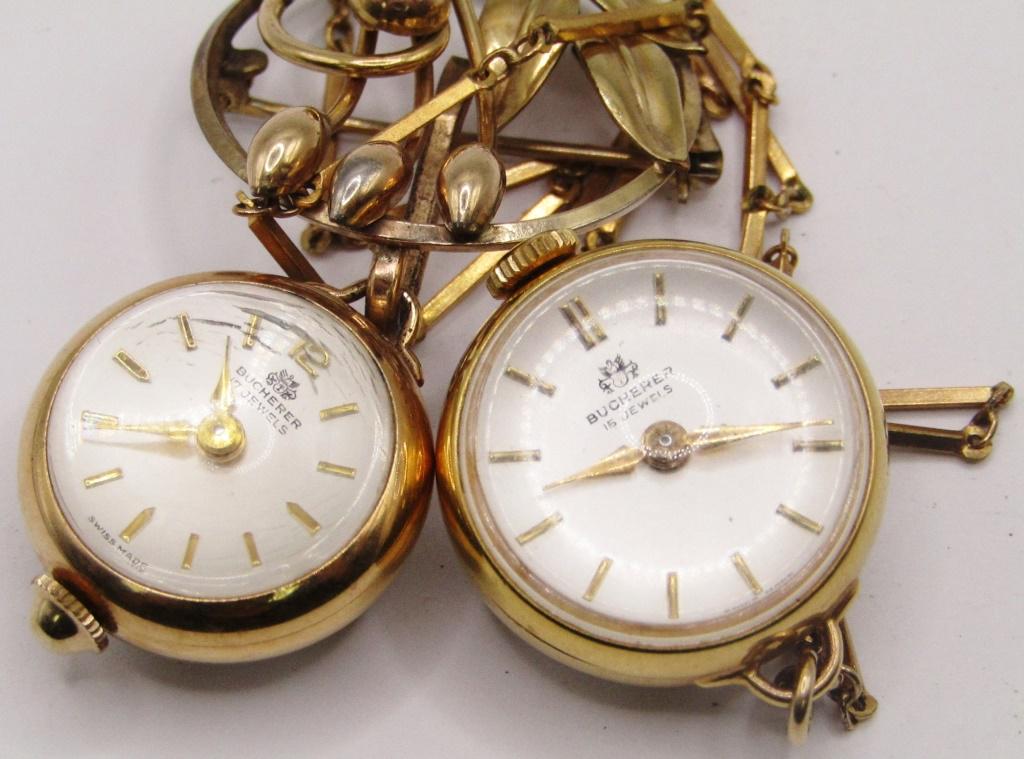 (2) BUCHERER SKELETON BUBBLE WATCHES: (1) WITH CHAIN / PENDANT - NOT RUNNING (1) PIN/BROOCH -RUNNING w/SCRATCHES on BUBBLE