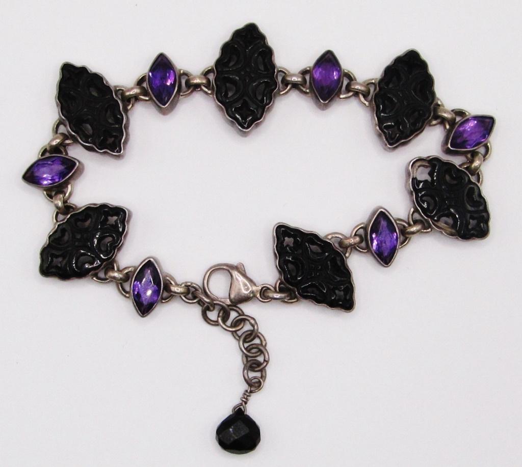 VINTAGE STERLING BRACELET WITH CARVED BLACK: LUCITE AND VIOLET STONES-MEASURES 8 INCHES-TOTAL 14 DWT