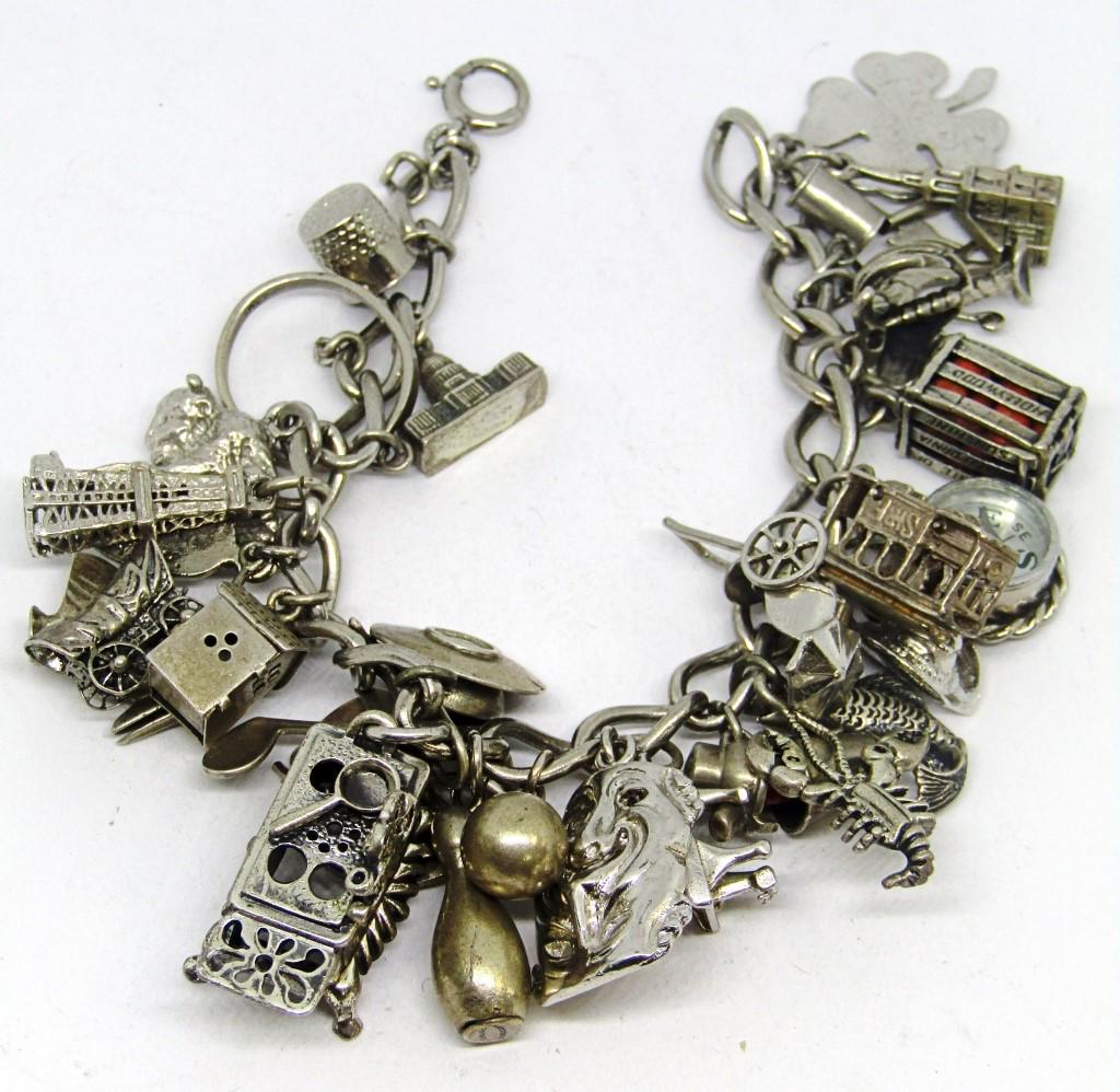 28 Charms Sterling Bracelet: DWT 55.8