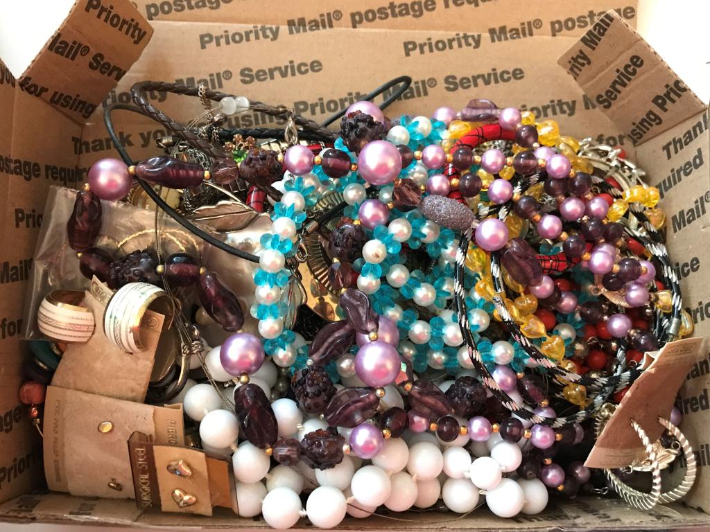 FLAT RATE BOX FULL OF SURPRISES: BID NOW!