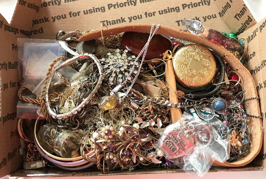 FLAT RATE BOX FULL OF SURPRISES: BID NOW!