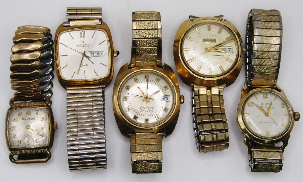5-VTG MEN'S GOLD TONED WRISTWATCHES: STRETCHY BANDS-TIMEX ELECTRONIC CALENDAR-BULOVA 23 JEWELS SELF WINDING-BENRUS DAY DATE(RUNNING)-HAMILTON MASTERPIECE DAY DATE-BULOVA-ALL WATCHES UNTESTED/PARTS/REPAIR