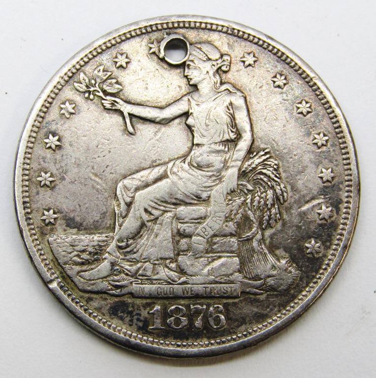 1876 TRADE DOLLAR - HOLED (1 of 2)