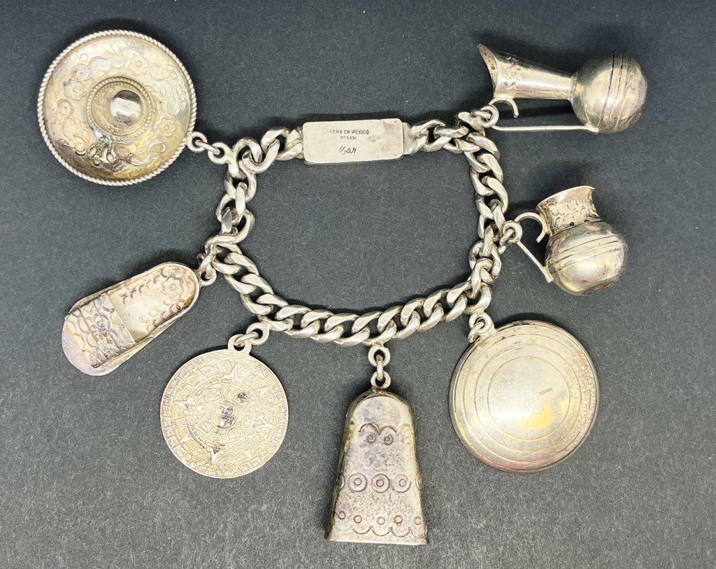 MAR HENCHO EN MEXICO CHUNKY CHARM BRACELET: WITH (7)CHARMS-MEASURES 7.5 INCHES-TOTAL 44 DWT