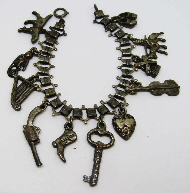 VINTAGE STERLING CHARM BRACELET LOADED WITH: CHARMS-TOTAL 27 DWT