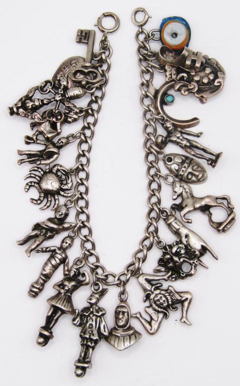 VINTAGE STERLING CHARM BRACELET LOADED WITH: ECLECTIC CHARMS-TOTAL 82.8 DWT
