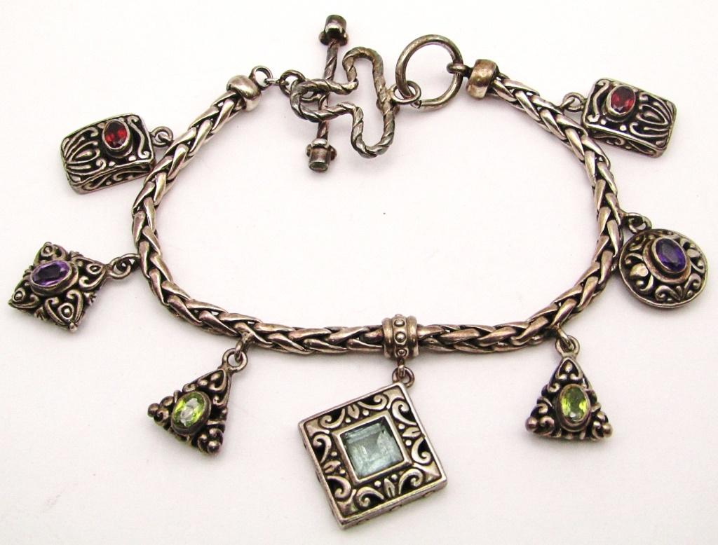 8-INCH STERLING BRACELET WITH DANGLY CHARMS: WITH MULTI COLOR STONE ACCENTS-TOTAL 32 DWT