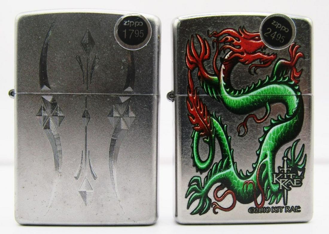 (2) CHROME DESIGNED ZIPPOS!: ONE WITH GREEN AND RED DRAGON- 2011; ONE WITH CURVES DESIGN-2010; IN BOXES