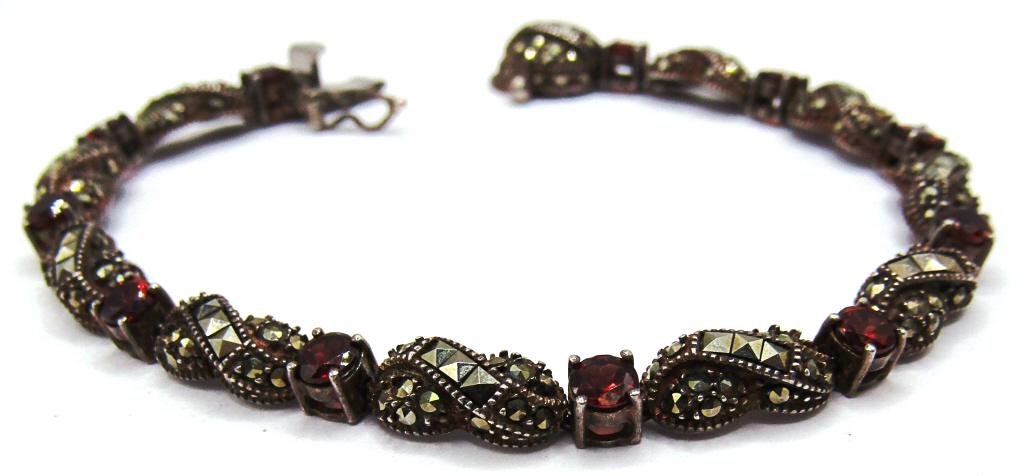 Vintage Sterling and Marcasite Bracelet: Bracelet with red stones and a good clasp. 9 in. long. (11 dwt)