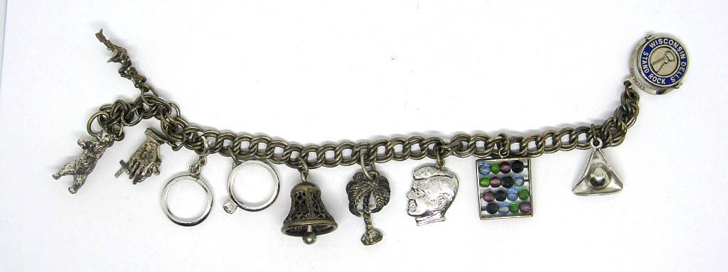 STERLING CHARM BRACELETS w/11 CHARMS: (5) CHARMS NOT STERLING (6) CHARMS STERLING - (20 DWT)