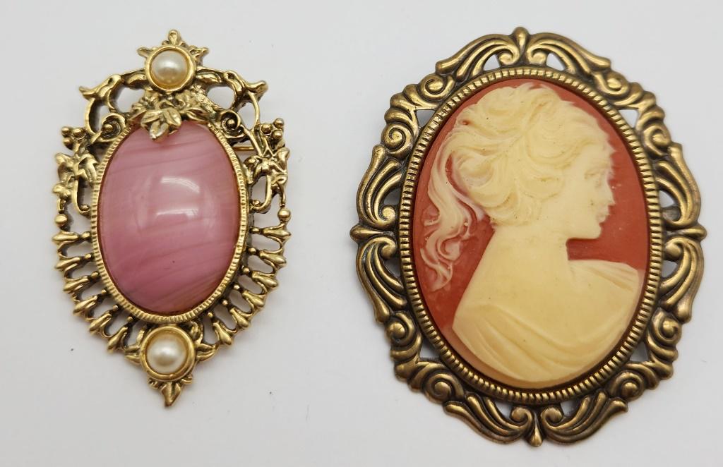 2-VINTAGE GOLD TONED BROOCHES: (1)CAMEO: (1)WITH PINK LUCITE & FAUX PEARLS