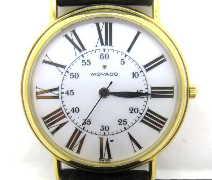Gents Movado Quartz Watch: Nice Roman Dial, Gold Plated Top/Steel Back; Back with Corporate Logo, New Strap, 33mm.
