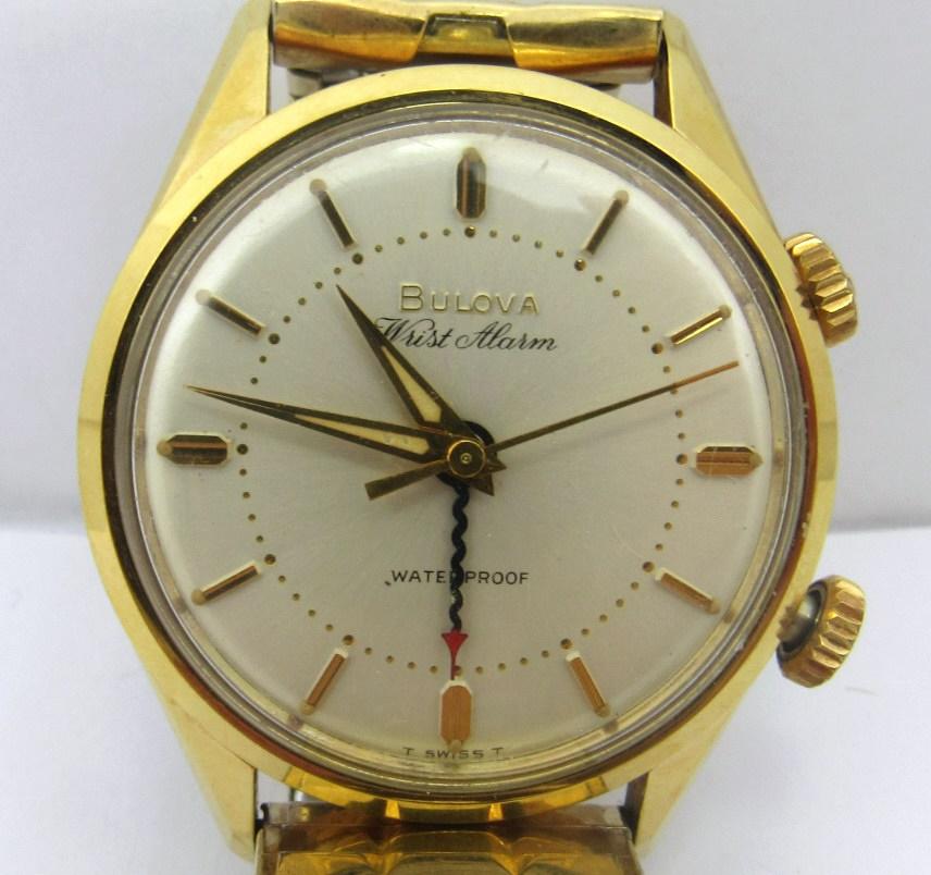 Gents Bulova Alarm Watch: Near Perfect Original Silver Dial; Gold Plated Top/Steel Back; Vintage JB Stretch Band, 34mm.
