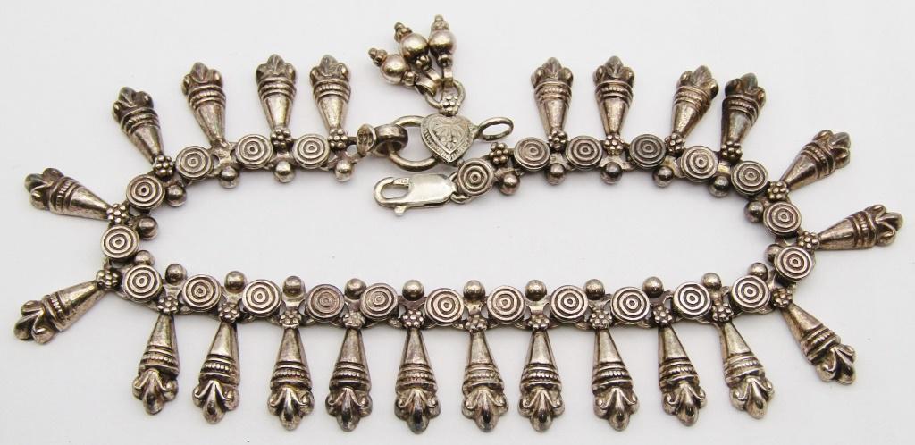 VINTAGE STERLING BRACELET WITH DANGLY CHARMS: MEASURES 8 INCHES-TOTAL 20 DWT
