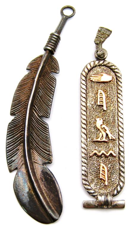 2-SOUTHWESTERN STERLING PENDANTS : (1)FEATHER: (1)AZTEC DESIGN WITH GOLD TONED ACCENTS-TOTAL 7 DWT
