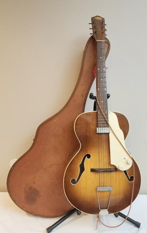 SUPRO ARCHTOP ELECTRIC GUITAR: Supro Archtop Electric Guitar . Nice condition considering age of instrument . Very minimal fret wear . Nice tone for intermediate aspiring jazz artist.