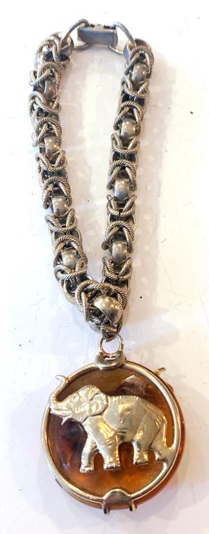 WARNER BROWN GLASS ELEPHANT BRACELET: BID TODAY!!!