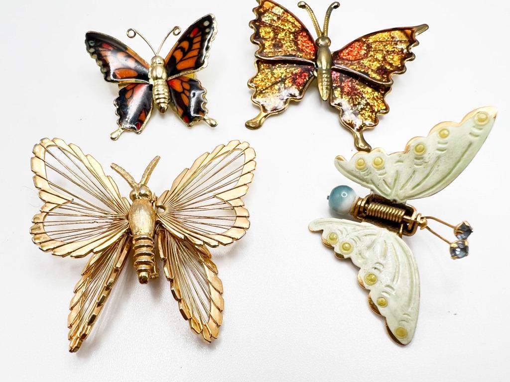 BUTTERFLIES FLUTTER BY !: BUTTERFLYS FLUTTER BY ! 1 MONET SIGNED GOLD TONE, 1 PASTEL GREEN SPRING HINGED WINGS WITH BLUE TAIL BALL, TWO COLOR BUTTERFLY