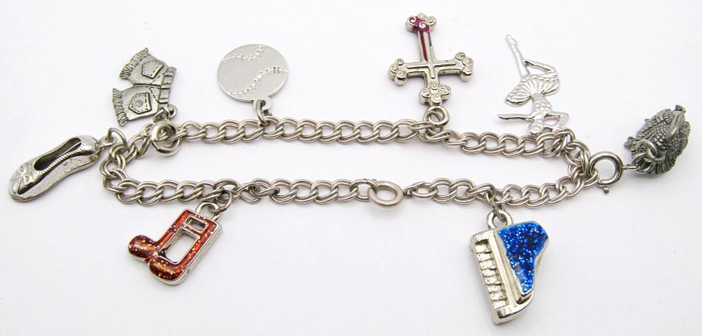 STERLING CHARM BRACELET w/(3) STERLING CHARMS: REST CHARMS ARE COSTUME (15 dwt)