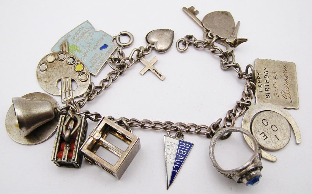 VINTAGE STERLING CHARM BRACELET CIRCA 1963 (1 of 6)