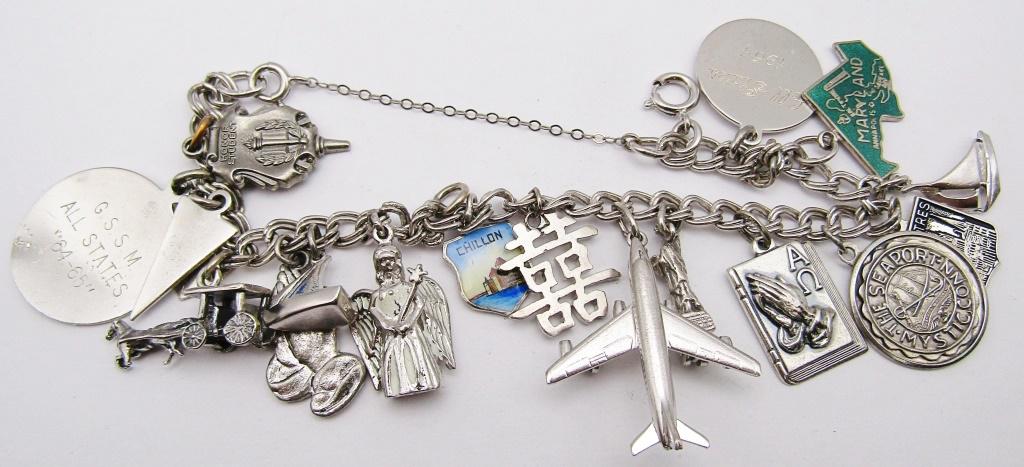 VINTAGE STERLING CHARM BRACELET CIRCA 1964 (1 of 4)
