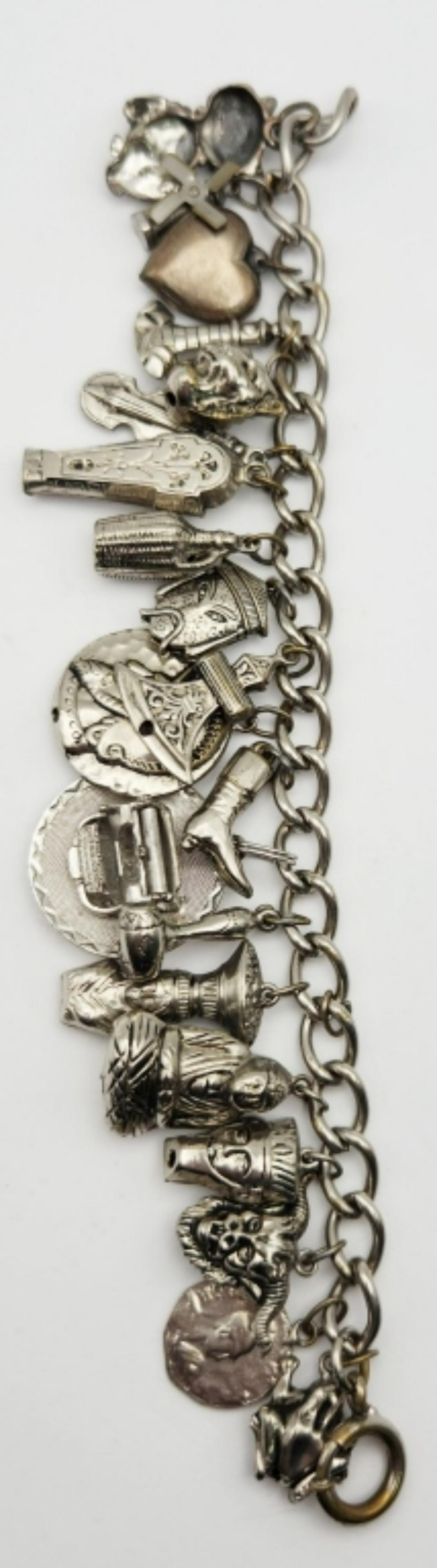 7 INCH SILVER TONED CHARM BRACELET LOADED (1 of 4)