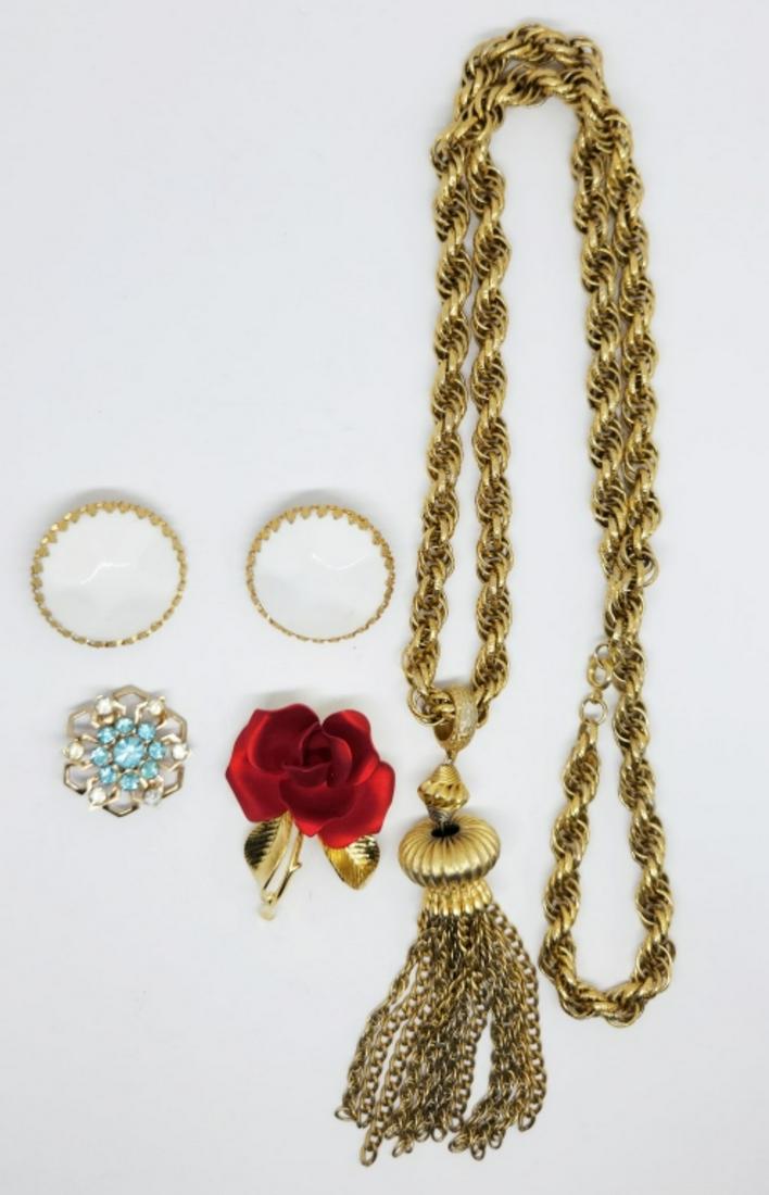 VINTAGE GOLD TONED JEWLERY LOT: (1)GERRITO: METAL ROSE BROOCH (1)PAIR OF CLIP ON CIRCULAR EARRINGS WITH WHITE LUCITE (1)FLOWER PIN WITH BABY BLUE AND CLEAR RHINESTONES & (1)36 INCH ROPE STYLE NECKLAC WITH TASSLE